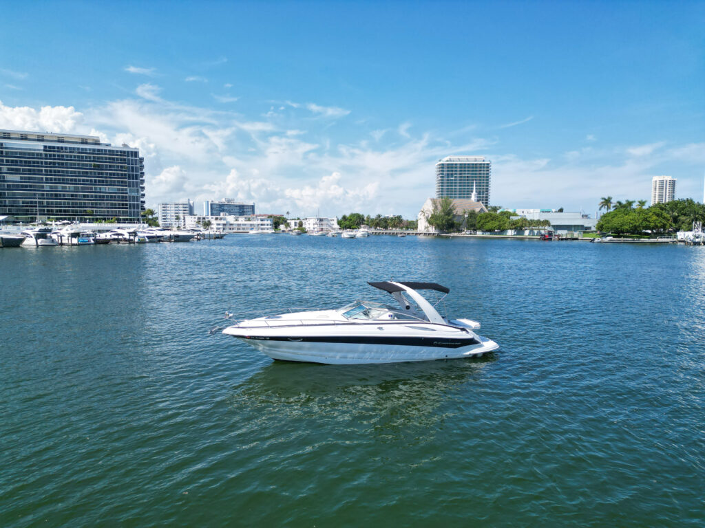 33ft Crownline “Estelita” Yacht Charter from Aquasol on Indian Creek, Miami Beach 1 %Miami Yacht Rentals%